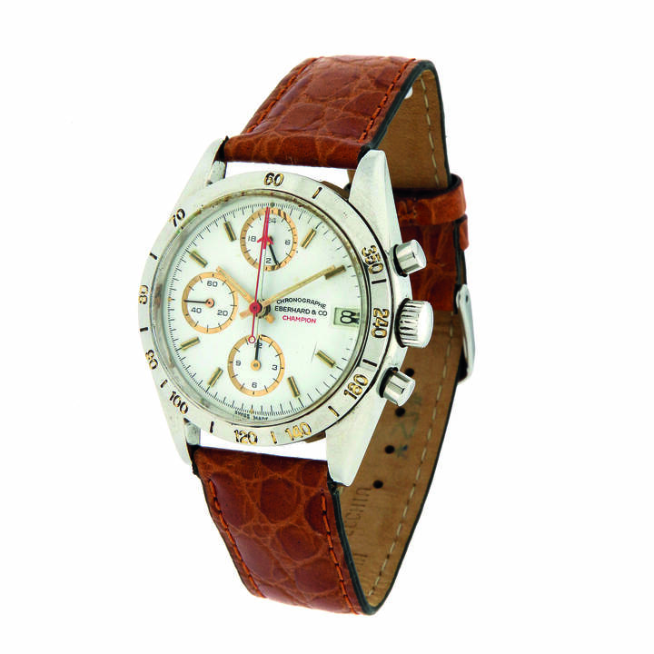 EBERHARD - Orologio cronografo a tre contatori, modello 'Champion', ref. 31022, anni '90<br>Diam 37<br>Cassa in acciaio in tre parti con tasti a pompa, lunetta con scala tachimetrica incisa; quadrante con indici applicati, contatore 24 ore al 12, secondi continui al 9, ore al 6<br>Movimento automatico calibro 5100