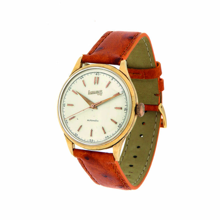 EBERHARD - Orologio solo tempo, referenza 11601, anni '60, Diam 36<br>Cassa in oro giallo in tre parti (con ansa storta), quadrante con indici a rilievo<br>Movimento automatico