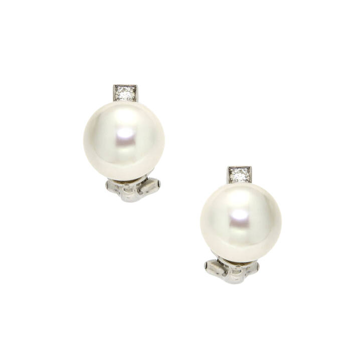 COPPIA DI ORECCHINI - Coppia di orecchini in oro bianco, a lobo, con due perle australiane del diam. di mm 11,0 e 11,2 sormontate da due diamanti taglio brillante per complessivi ct 0,15 ca