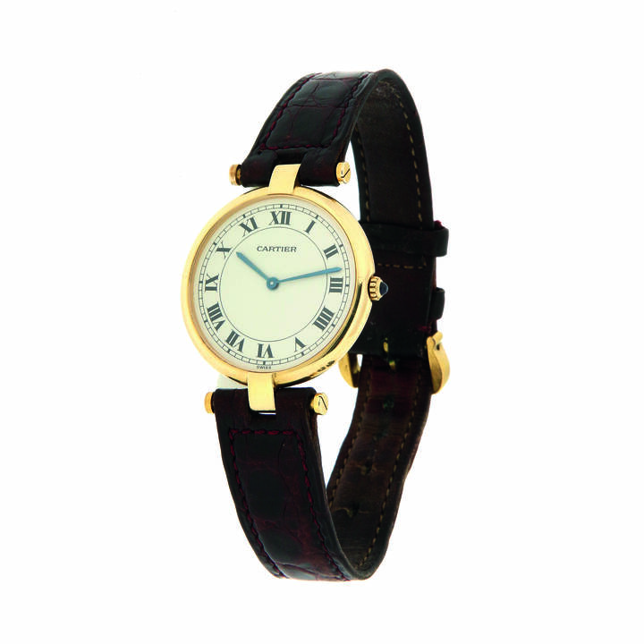 CARTIER - Orologio 'Must de Cartier Vendome' anni '90<br>Diam 30<br>Cassa in oro giallo in due parti; quadrante serigrafato con numerazione romana; minuteria a binario; lancette azzurrate