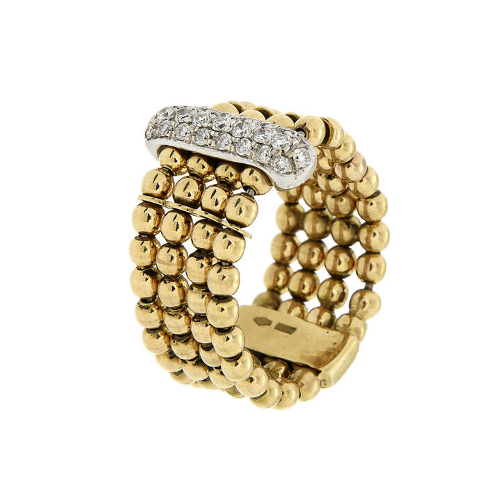 ANELLO - Anello composto da quattro file di boules in oro giallo; al centro elemento di forma ovale in oro bianco con diamanti taglio brillante per complessivi ct 0,30 ca