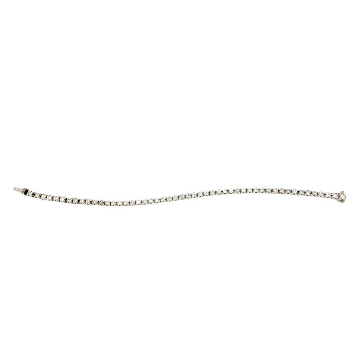 BRACCIALE - Bracciale in oro bianco, modello tennis, con cinquanta diamanti taglio brillante per complessivi ct 2,60 ca<br>Peso g 15,2<br>
