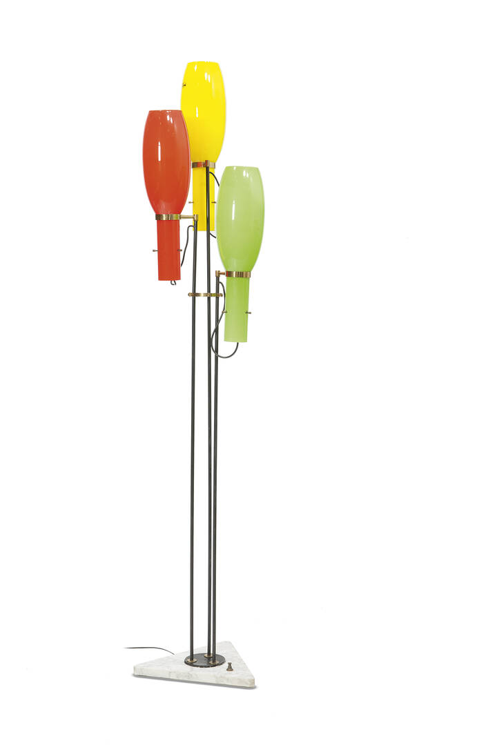 STILNOVO - Lampada da terra con fusto in metallo verniciato e ottone, diffusori in vetro colorato.