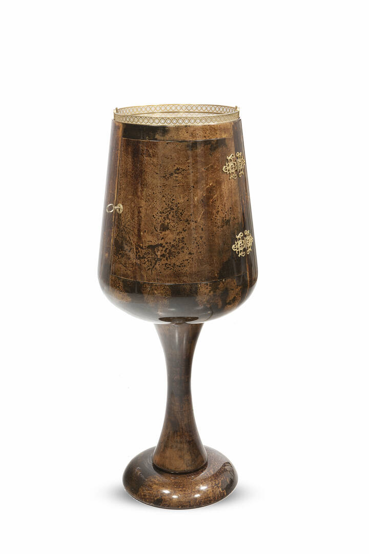 ALDO TURA - Mobile bar rivestito in pergamena vetrificata e decorato con applicazioni in bronzo.