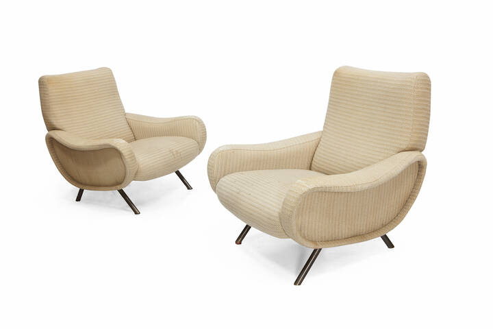 MARCO ZANUSO - Lady<br>Coppia di poltrone con struttura metallica a stampo ed imbottitura rivestita in tessuto.