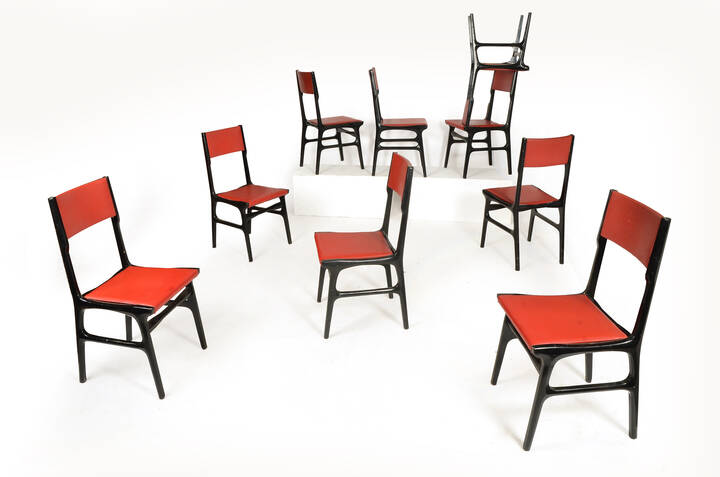 CARLO DE CARLI, attribuito - Nove sedie in legno ebanizzato e