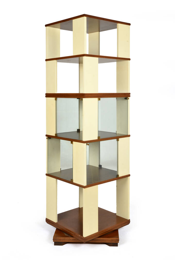 PRODUZIONE ITALIANA - Libreria girevole in legno di noce laccato.