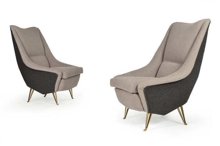 I.S.A - Coppia di poltrone con supporti in ottone,