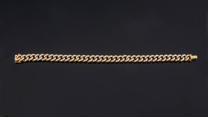 BRACCIALE - in oro rosa lavorato a maglia groumette in diamanti taglio brillante per complessivi ct 2,50 ca