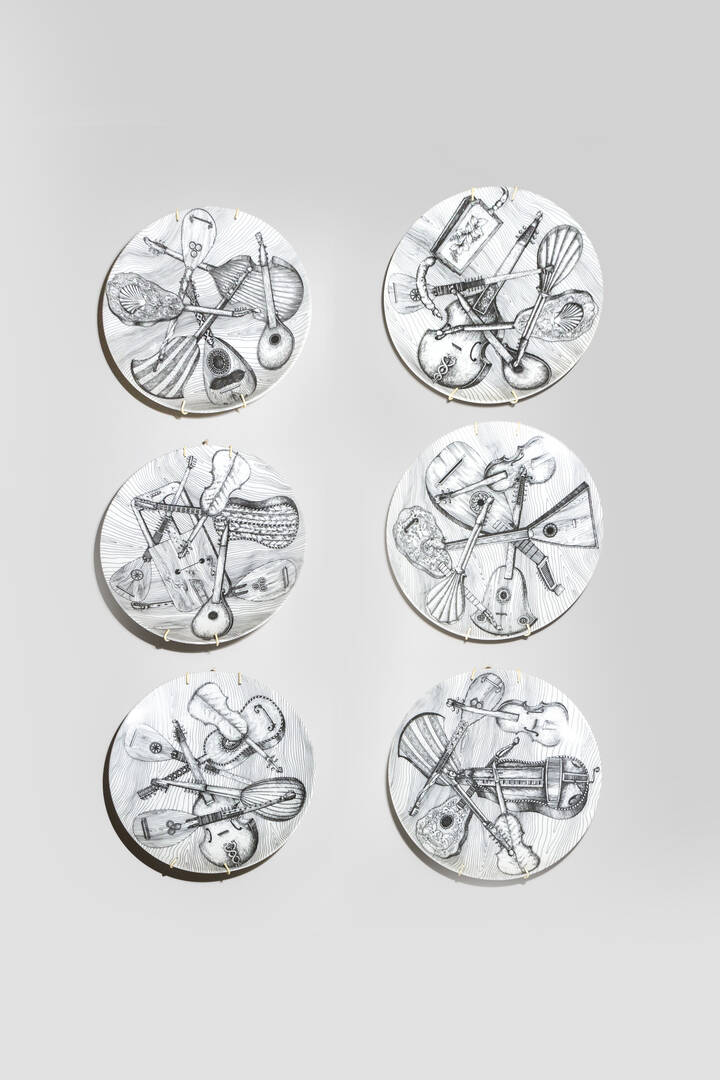 PIERO FORNASETTI - Lotto di 6 piatti della serie'Strumenti', anni '60