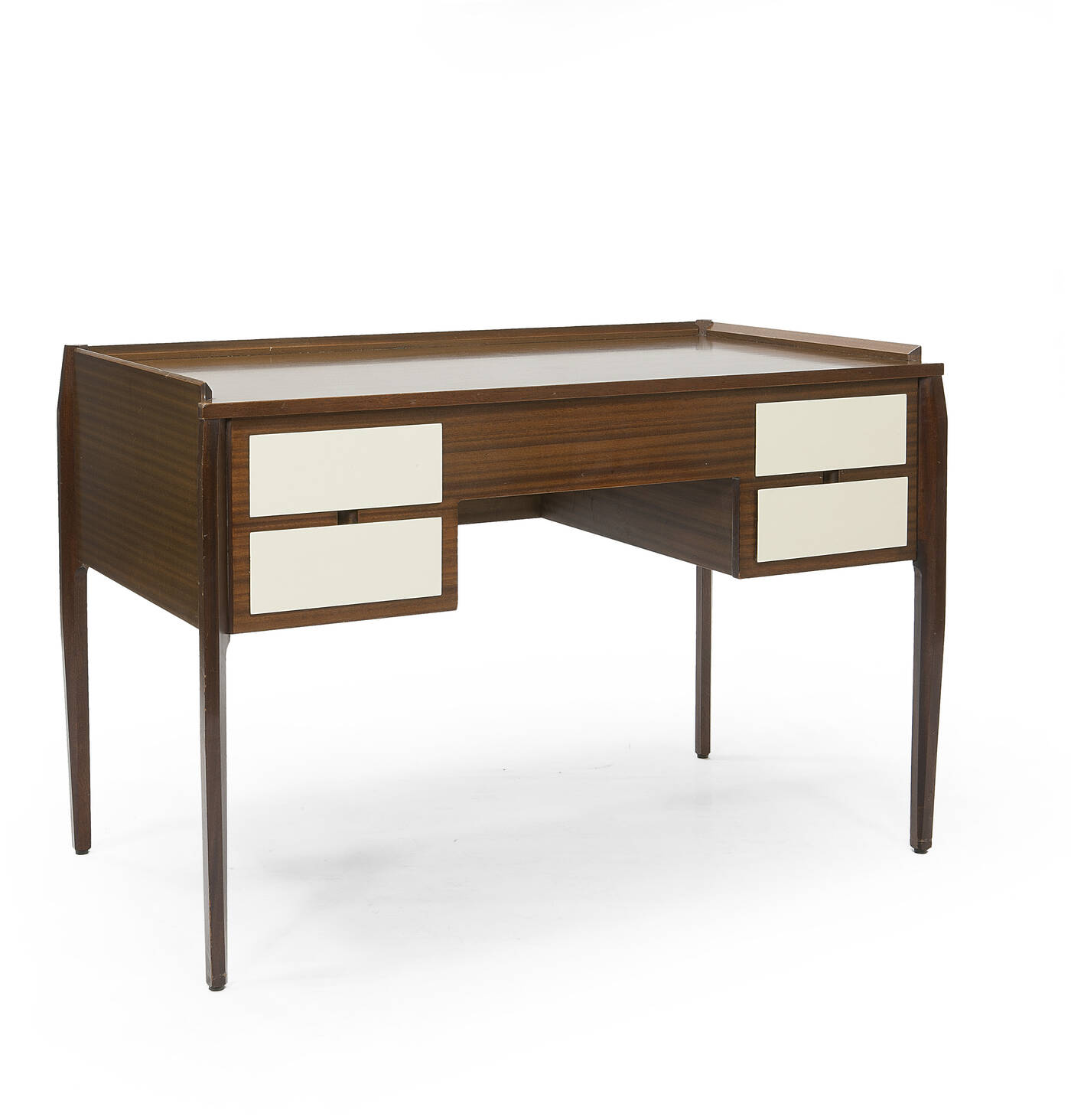 GIO PONTI - Scrivania da centro con struttura in legno di mogano e impiallacciatura in mogano, cassetti laccati.