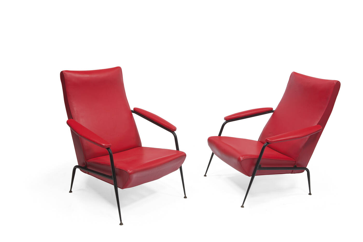 PRODUZIONE ITALIANA - Coppia di poltrone in tondino verniciato e ottone, seduta imbottita in skai.