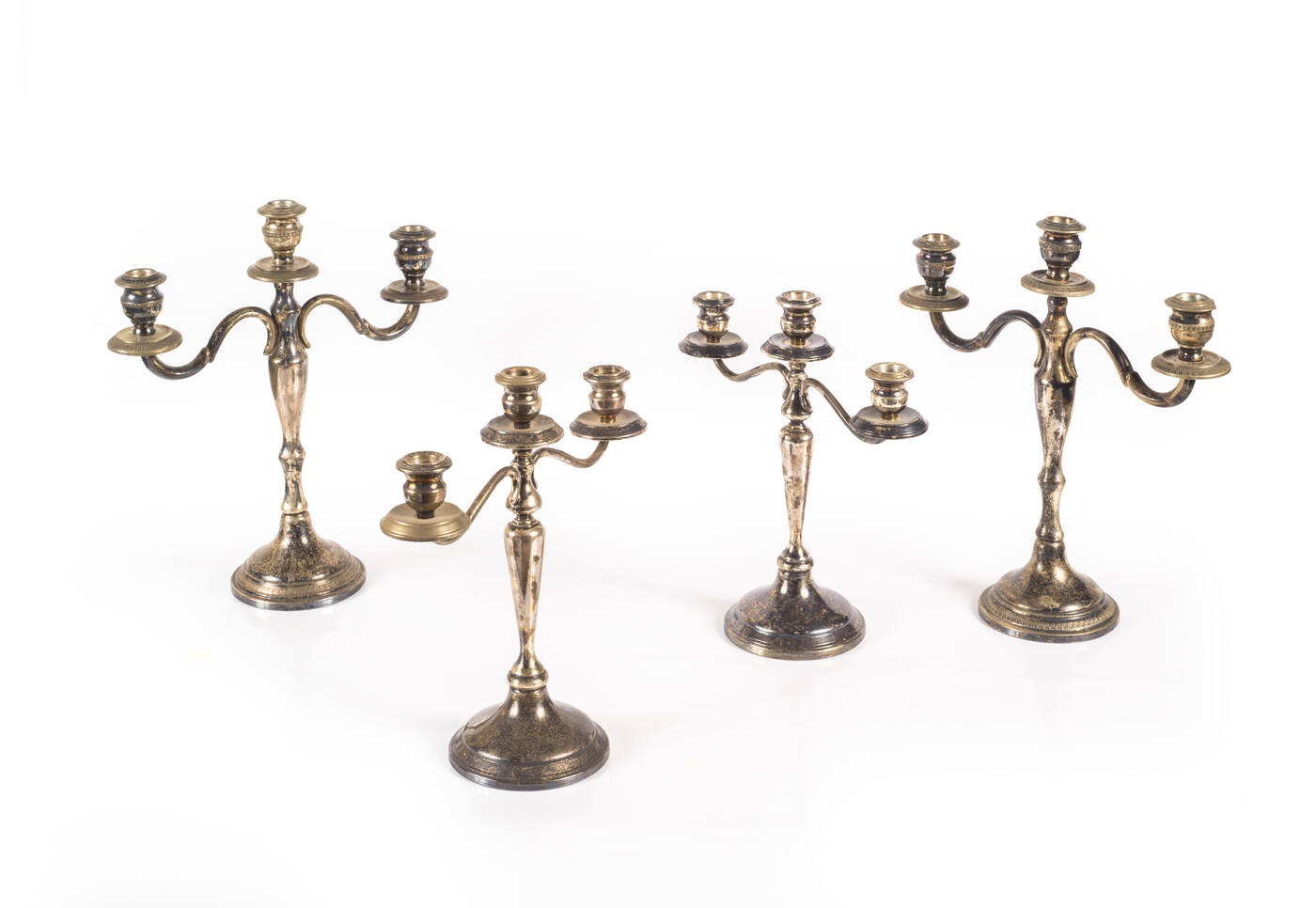 LOTTO DI QUATTRO CANDELABRI