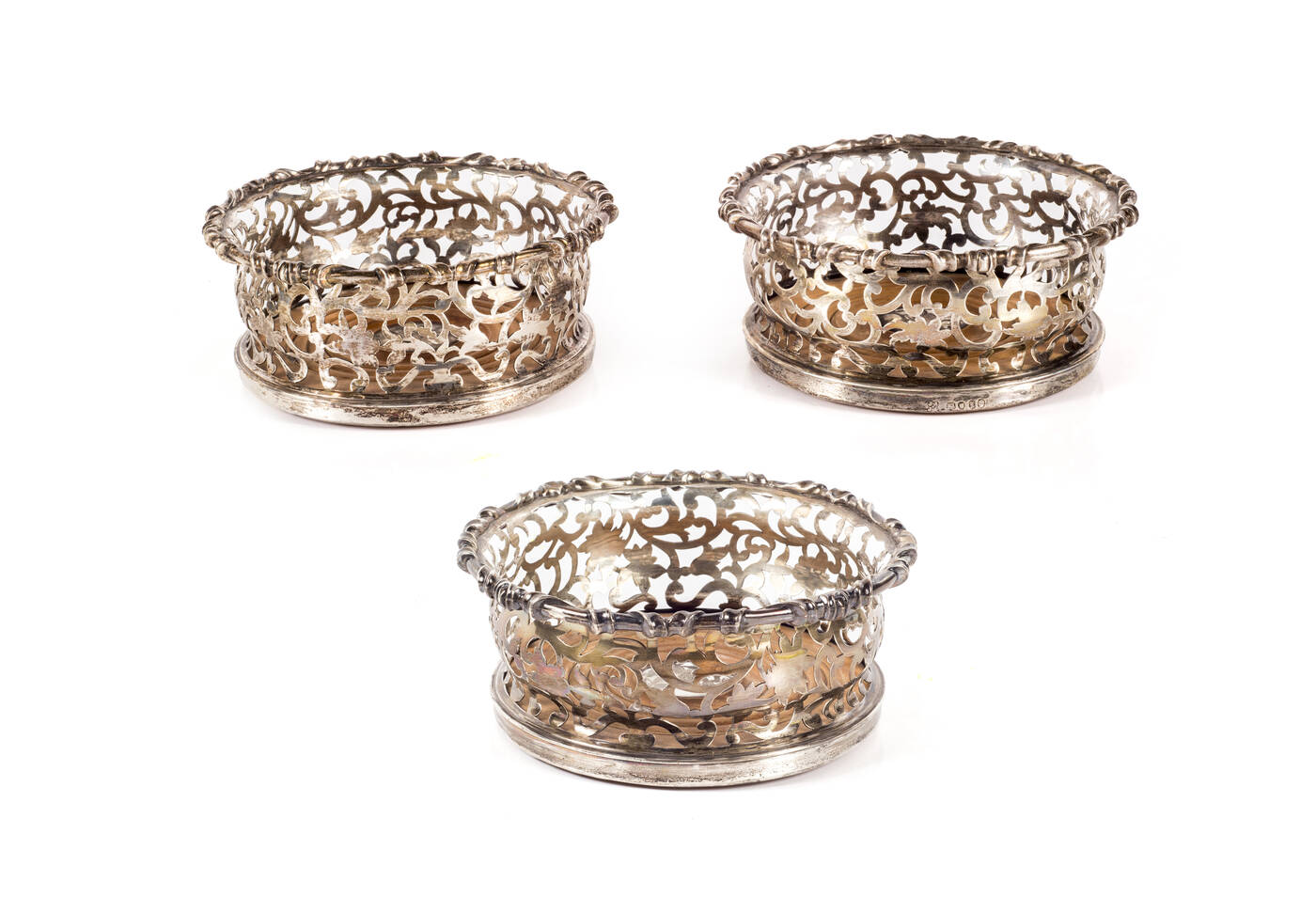 TRE SOTTOBOTTIGLIE IN ARGENTO