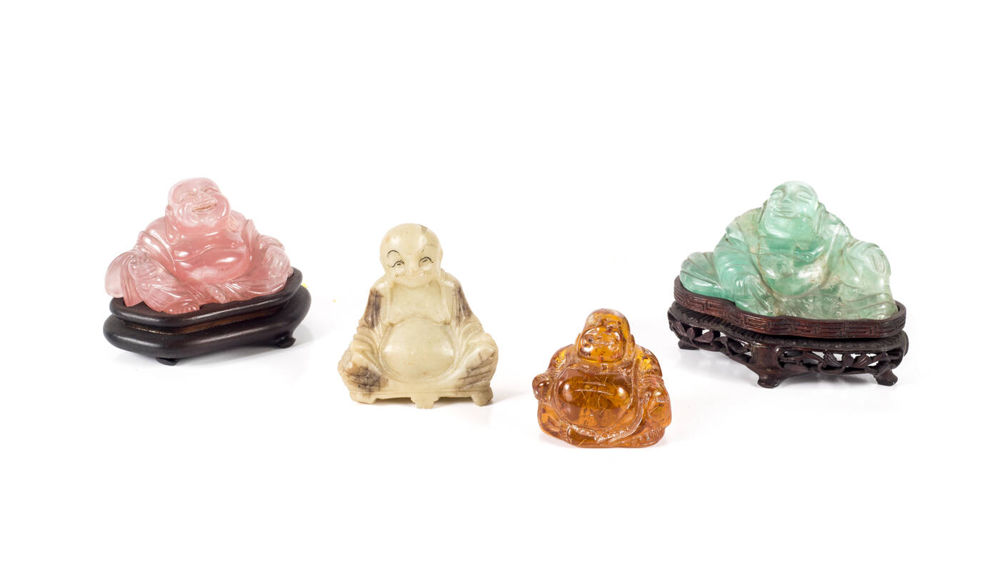 LOTTO DI QUATTRO SCULTURE ORIENTALI