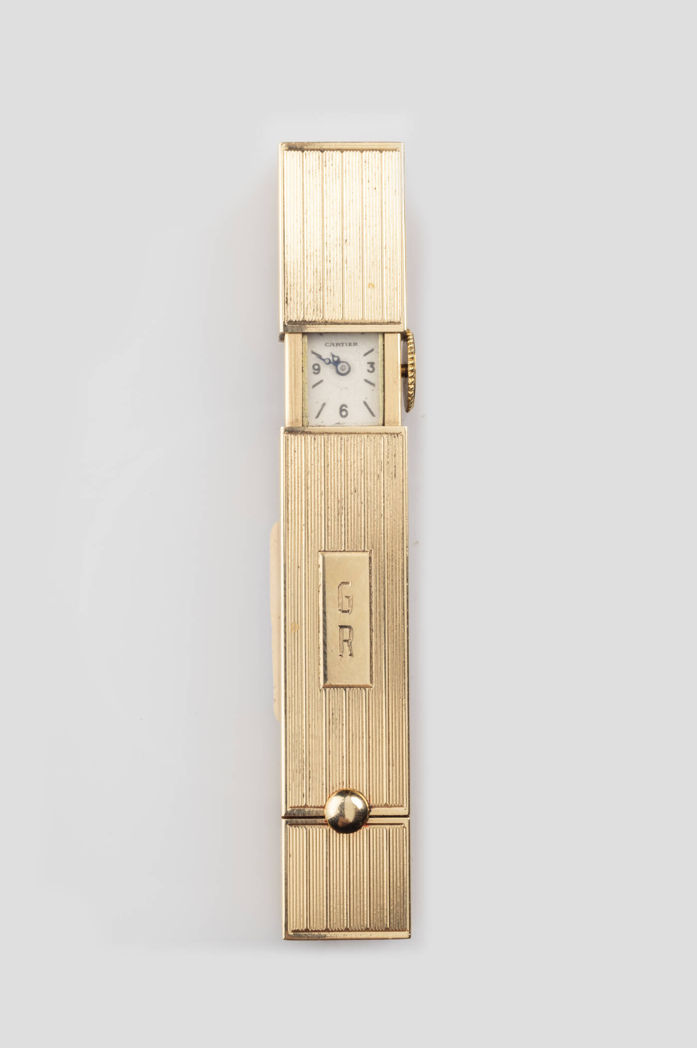 CARTIER - Particolare portarossetto con orologio