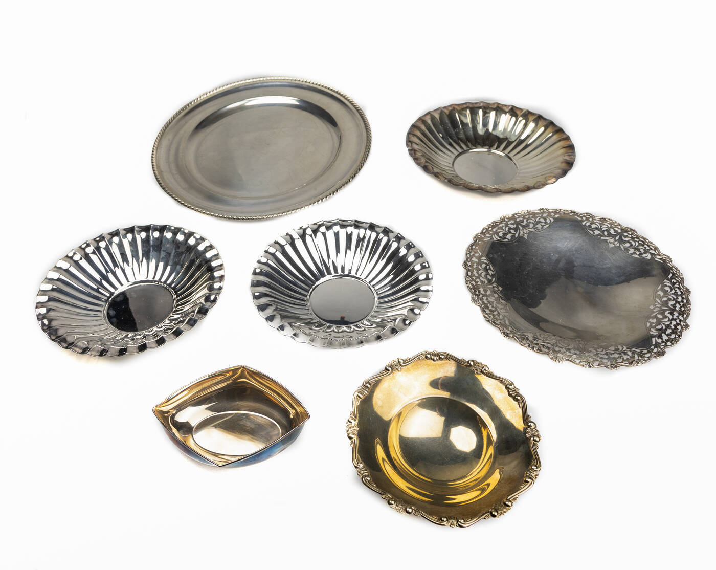 LOTTO DI SETTE OGGETTI IN ARGENTO