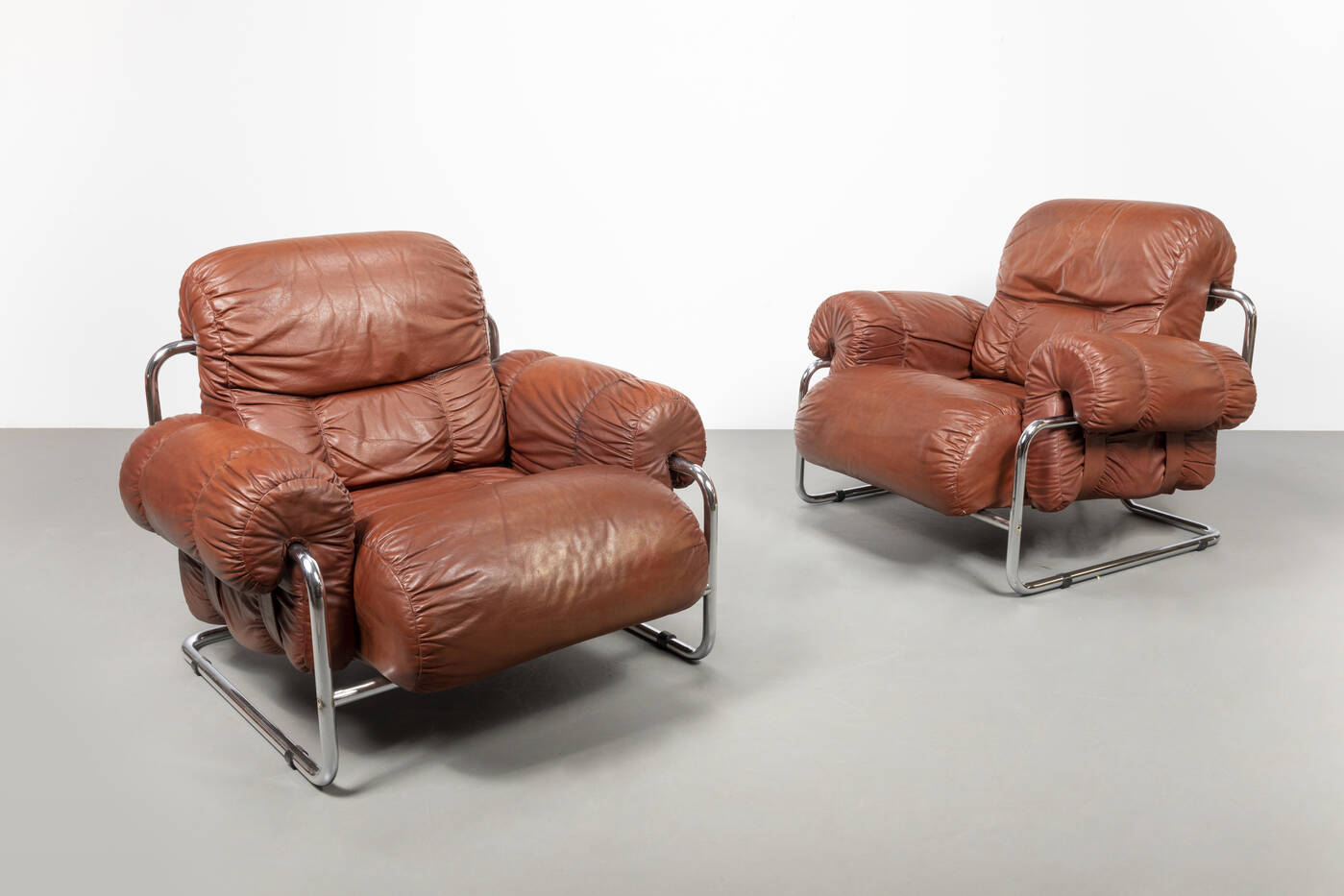 GUIDO FALESCHINI - Coppia di poltrone della serieTucroma 