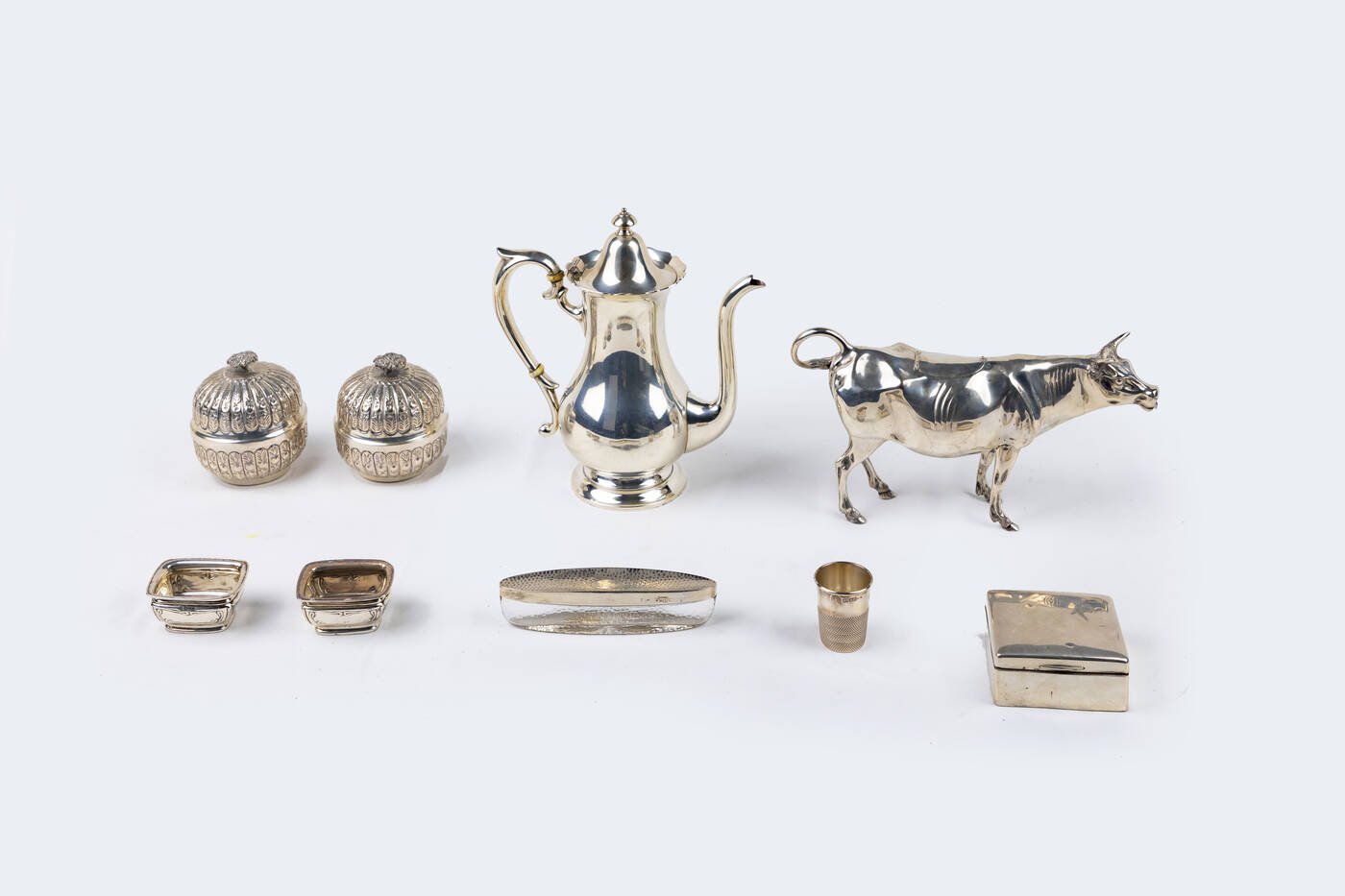 LOTTO DI NOVE OGGETTI IN ARGENTO