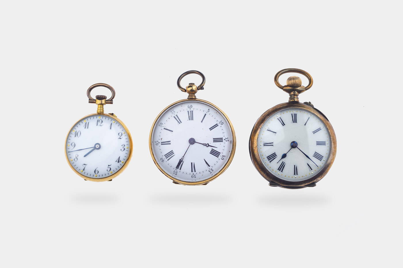 LOTTO DI TRE OROLOGI DA COLLO