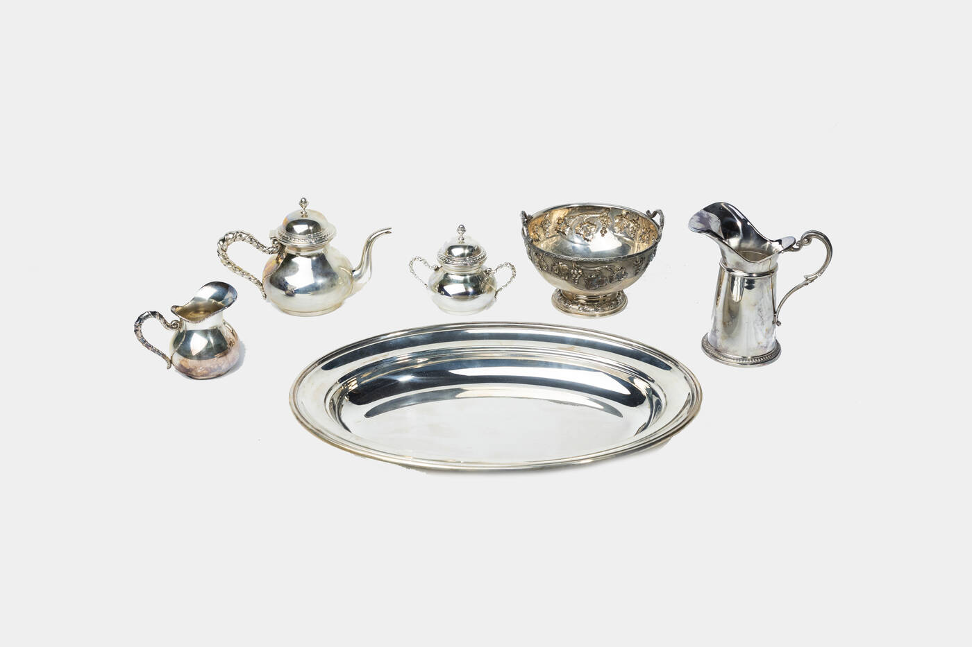 LOTTO DI SEI OGGETTI IN ARGENTO
