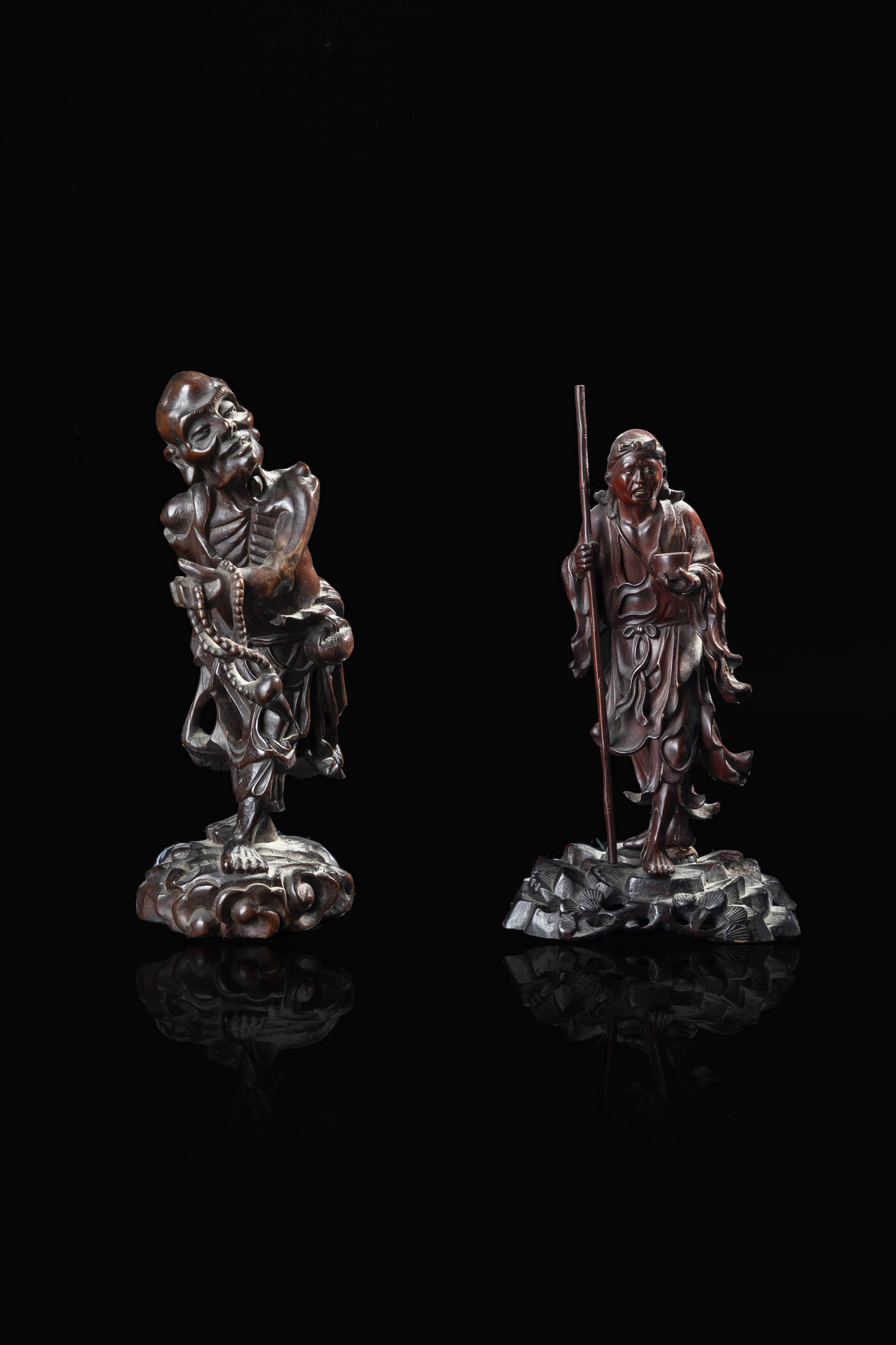 PAIR OF WOODEN FIGURES