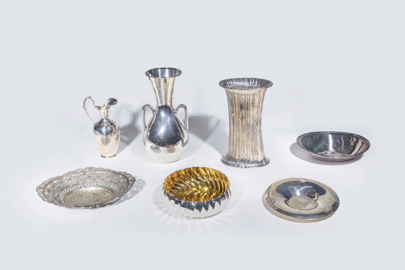 LOTTO DI SETTE OGGETTI IN ARGENTO