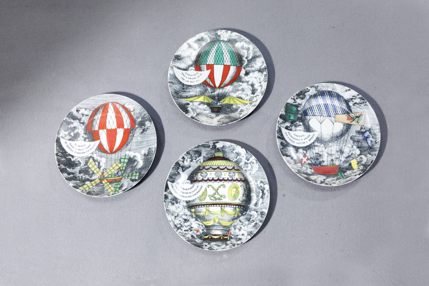 PIERO FORNASETTI - Quattro piatti della serie Mongolfiere